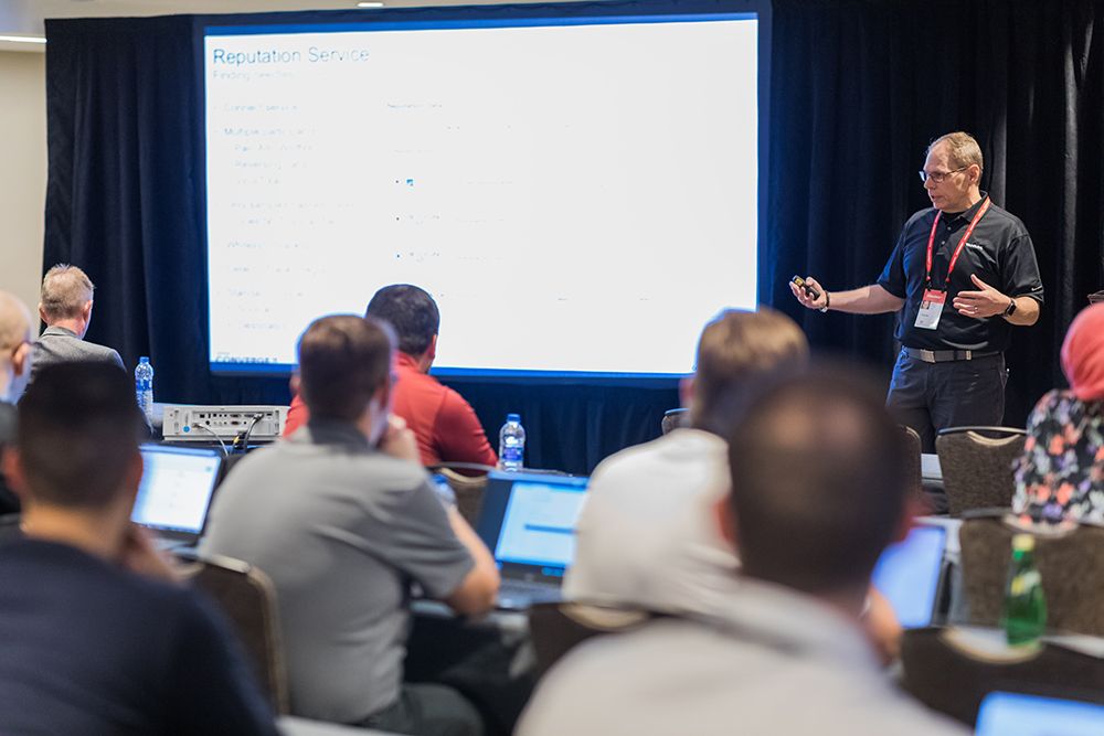 Presenter giving technical lab session to audience at CONVERGE 2019