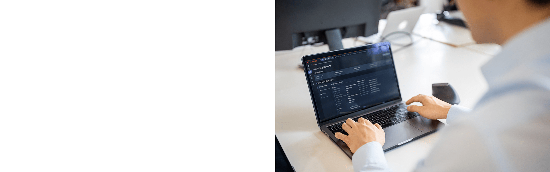Person using Tanium dashboard on laptop for endpoint management