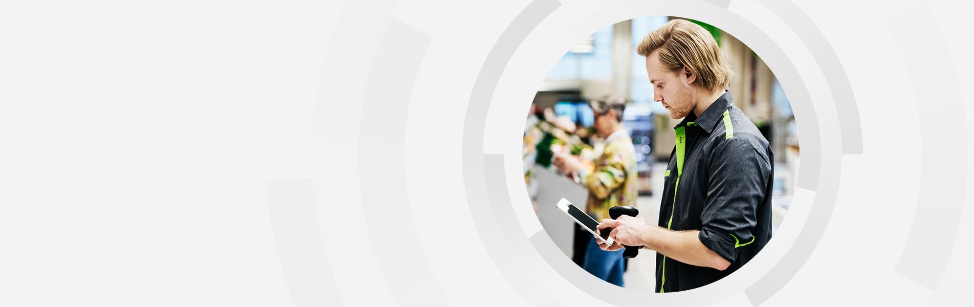 Retail associate using tablet in store environment
